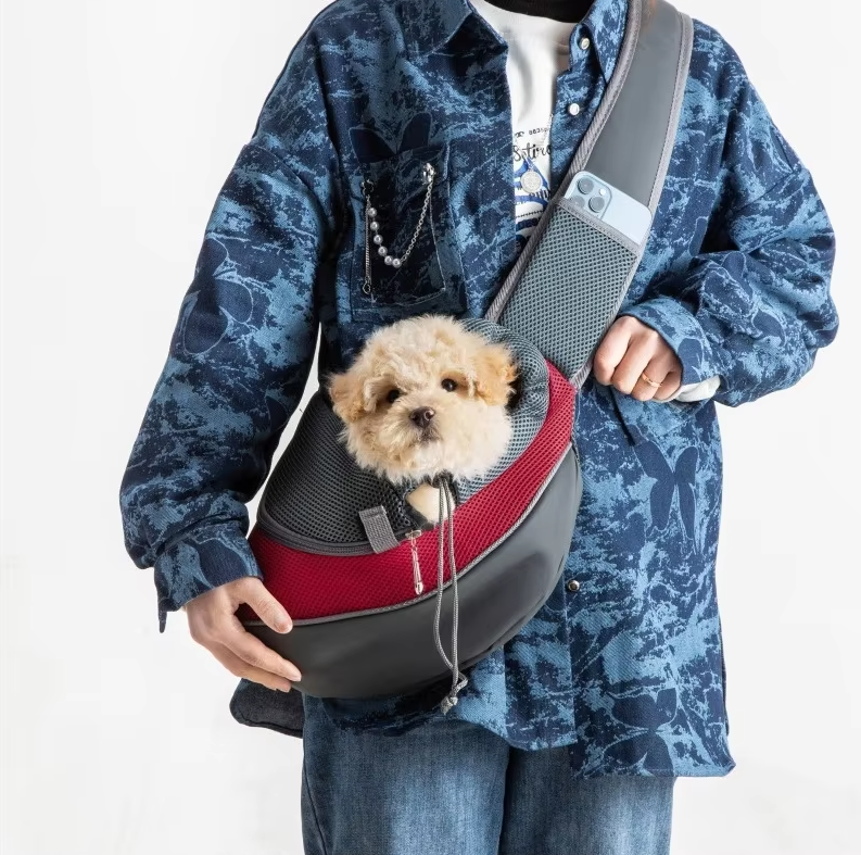 Unisex pet carrier shoulder bag for small dogs and cats, breathable fabric, ideal for car travel.