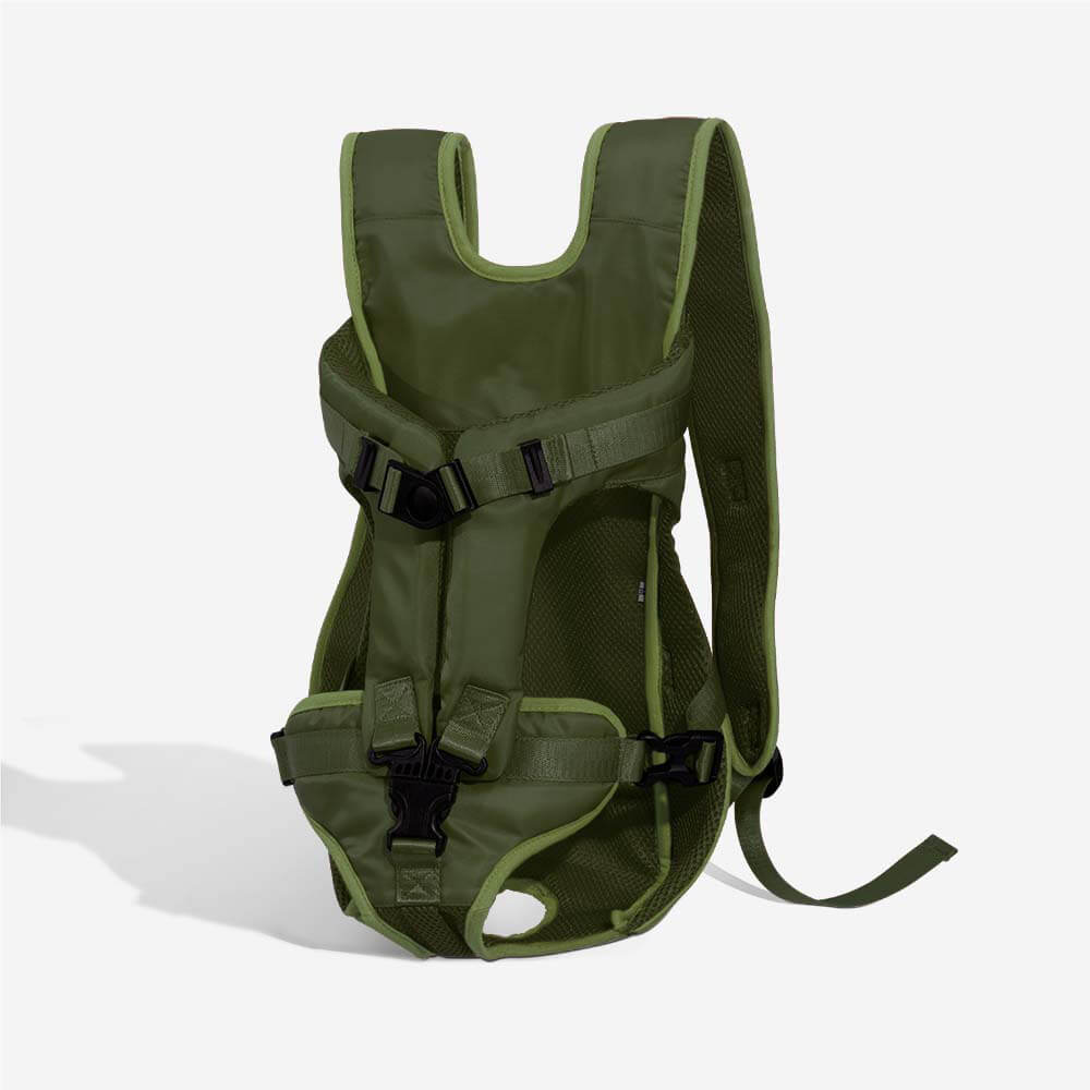 Breathable dog carrier backpack in action, being worn by a person on a hike.