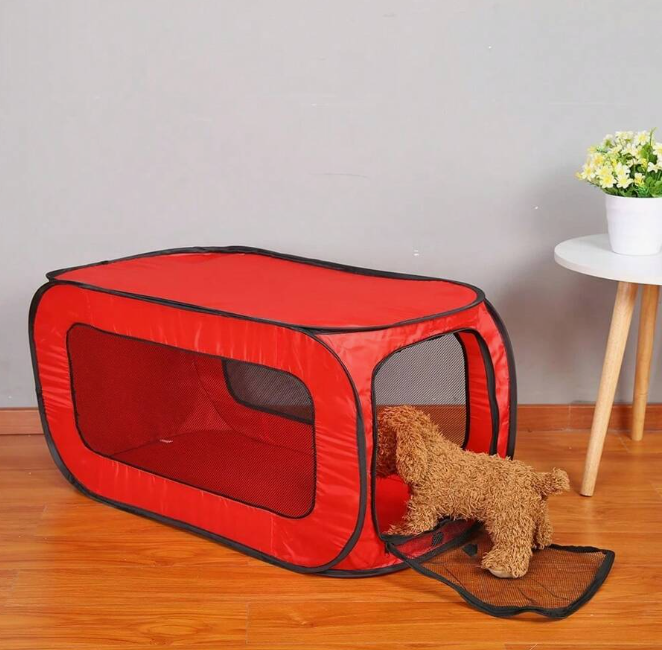 Gray fabric dog bed crate featuring cheerful paw patterns, collapsible for easy transport and storage.