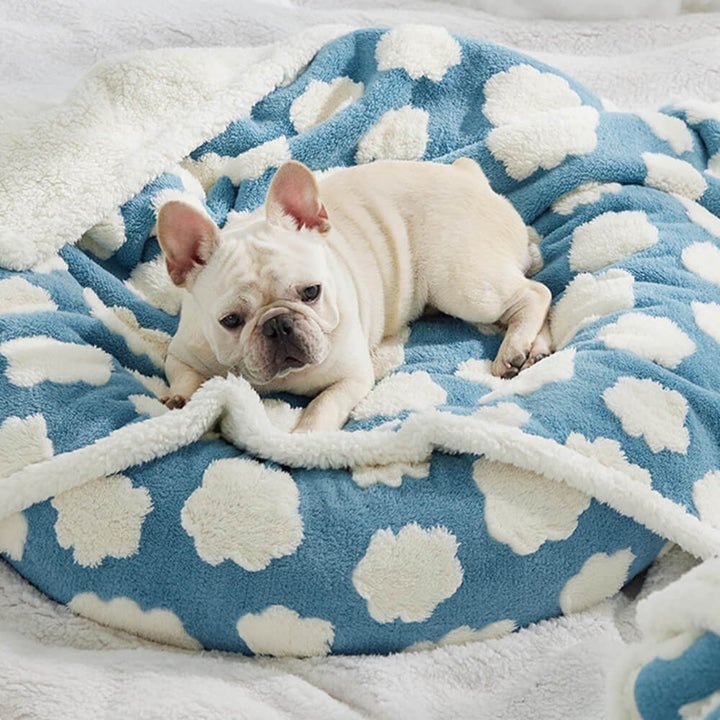 High-quality sherpa fleece pet blanket, waterproof and machine washable, essential for pet owners.