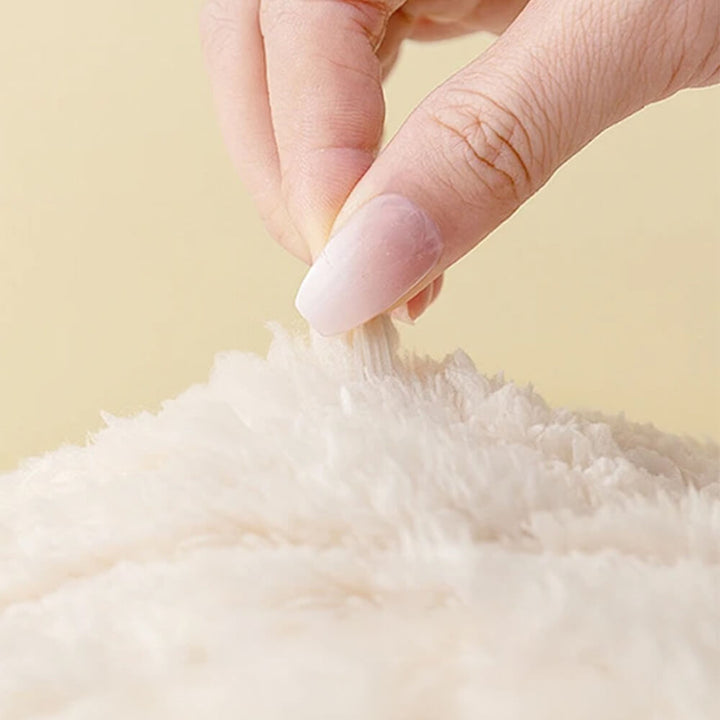 Dog enjoying a comfortable, waterproof sherpa fleece pet blanket, keeping furniture clean and protected.