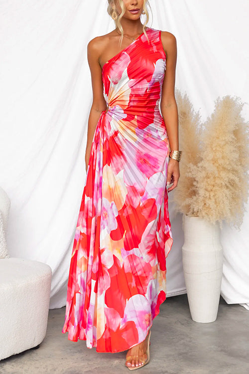Asymmetric one-shoulder women's gown with vibrant print & elegant pleats. Ideal for evening or parties.