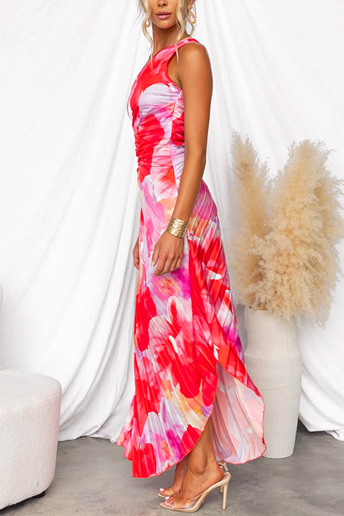Women's vibrant printed one-shoulder gown, an eye-catching occasion dress. Perfect for wedding guests.