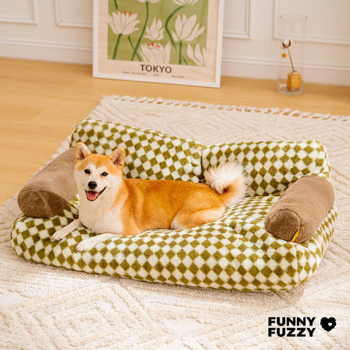 Small dog bed resembling a vintage sofa with elegant diamond pattern upholstery