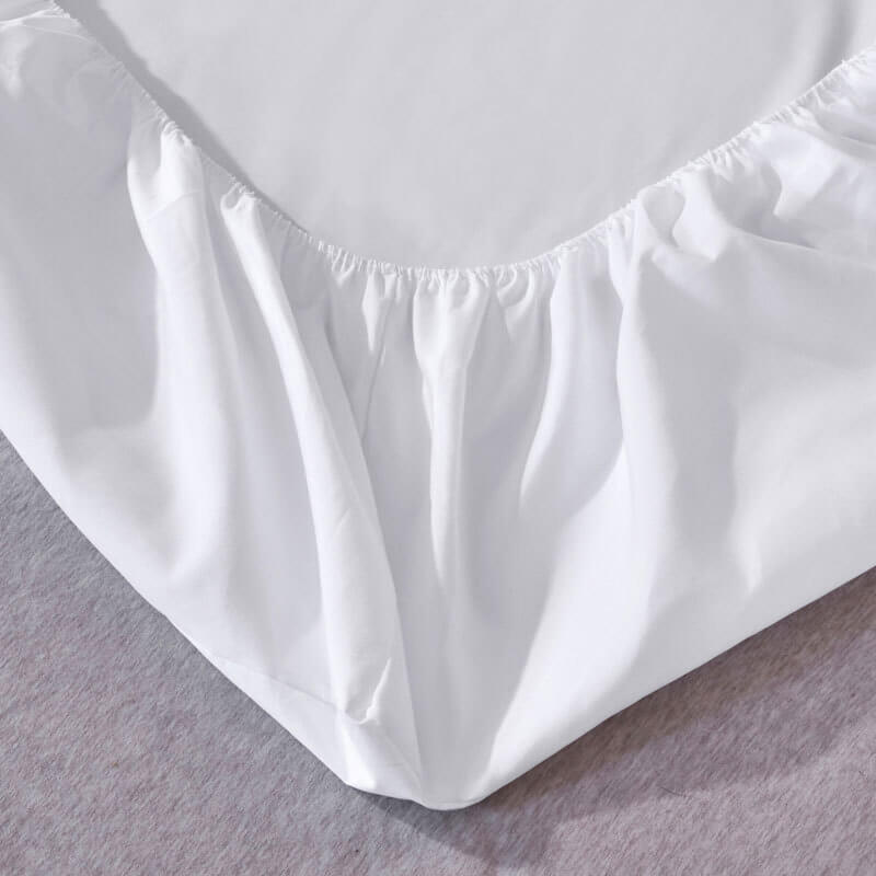 Skin-friendly waterproof fitted sheet set, enhancing bedroom decor with comfort and mattress protection.
