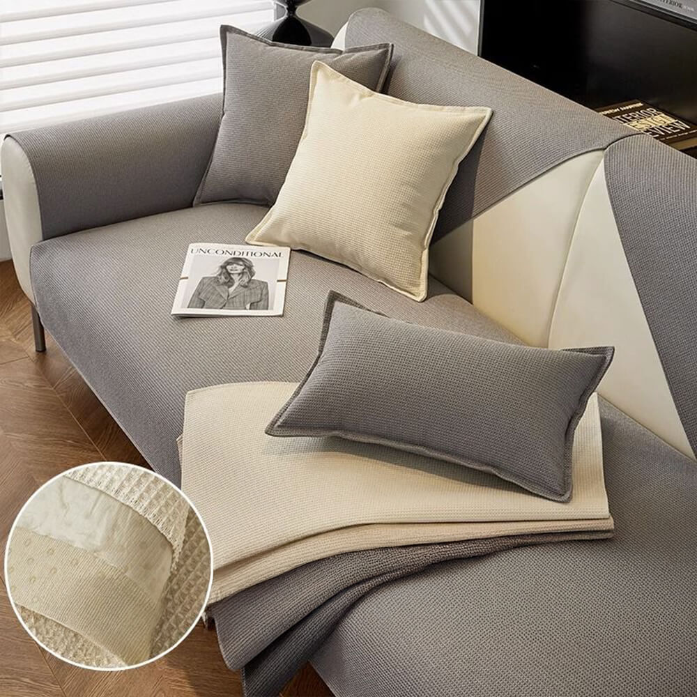 Waterproof pet-friendly sofa cover in gray, polyester, protecting furniture from spills and pet hair