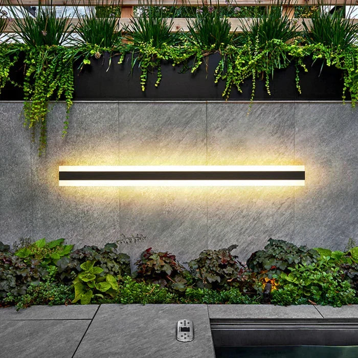 Stylish modern outdoor LED wall lamp, weather-resistant for exterior home lighting. Energy-efficient patio fixture.