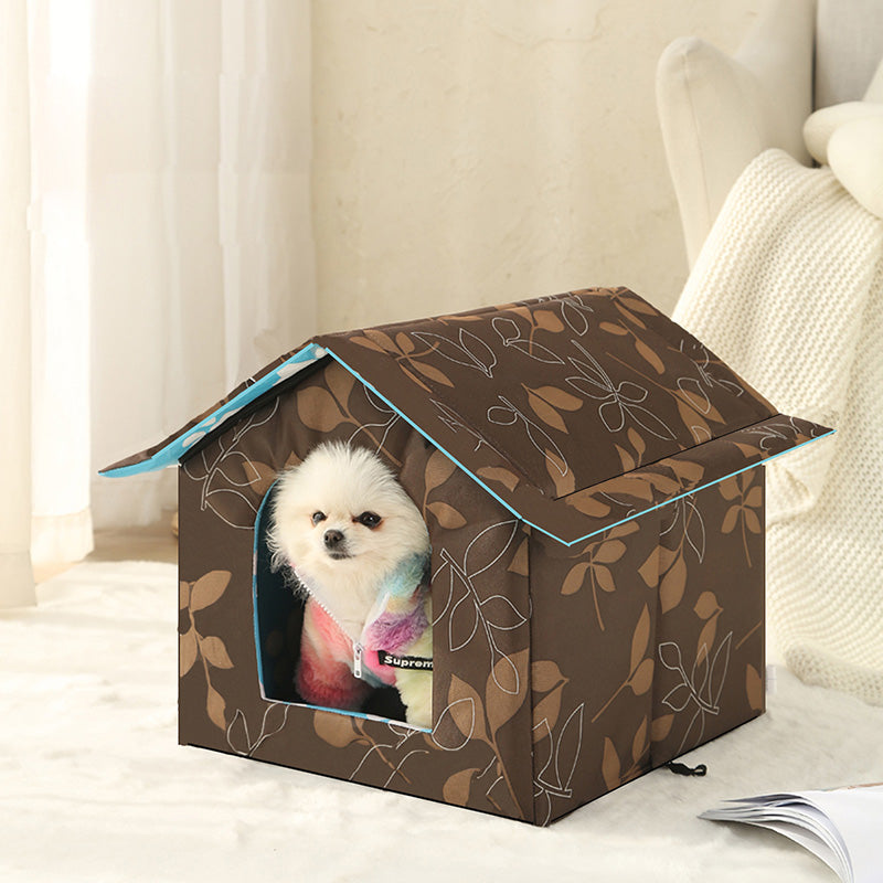 Weatherproof outdoor shelter for pets, offering a warm self-warming pad interior.