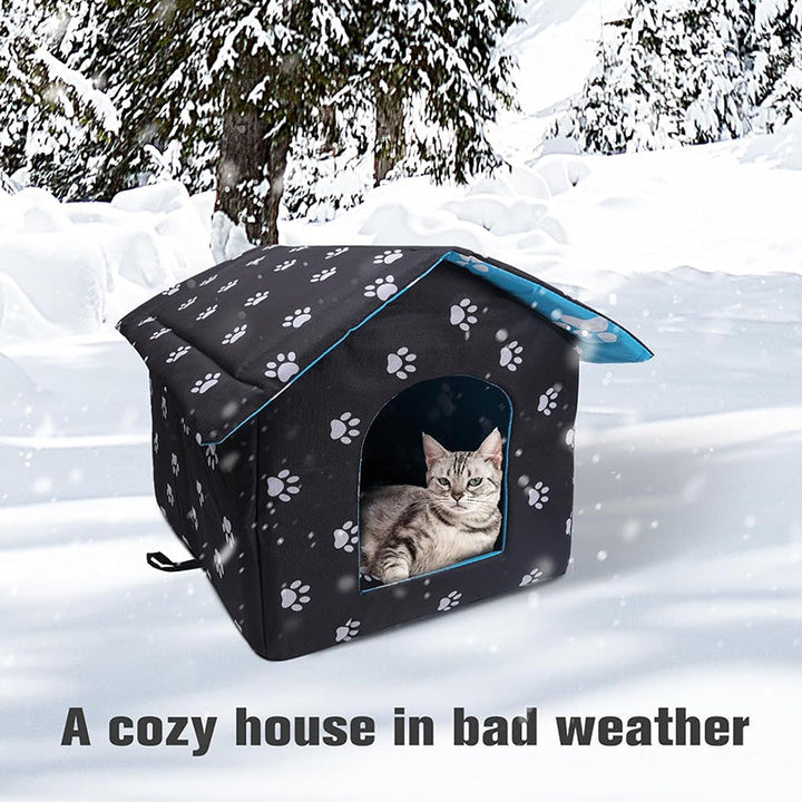 Outdoor pet shelter with cozy self-warming pad, suitable for small pets.