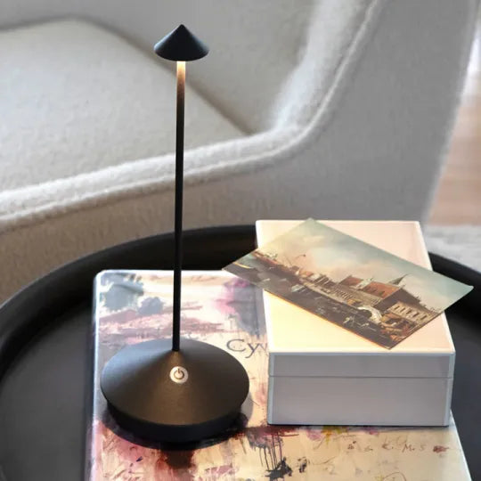 Elegant wireless LED table lamp, dimmable. Portable lighting for any home decor style, indoor/outdoor.