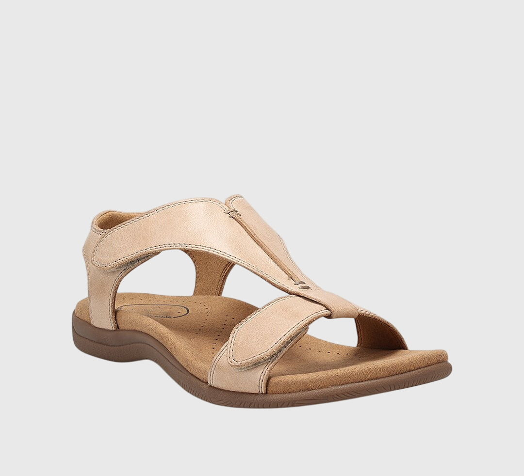 Women's comfort T-bar sandals. Adjustable, flat design with orthopedic arch support for everyday walking.