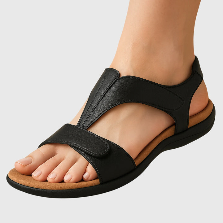 Lightweight women's flat T-bar sandals. Orthopedic comfort, adjustable straps for secure, all-day wear.