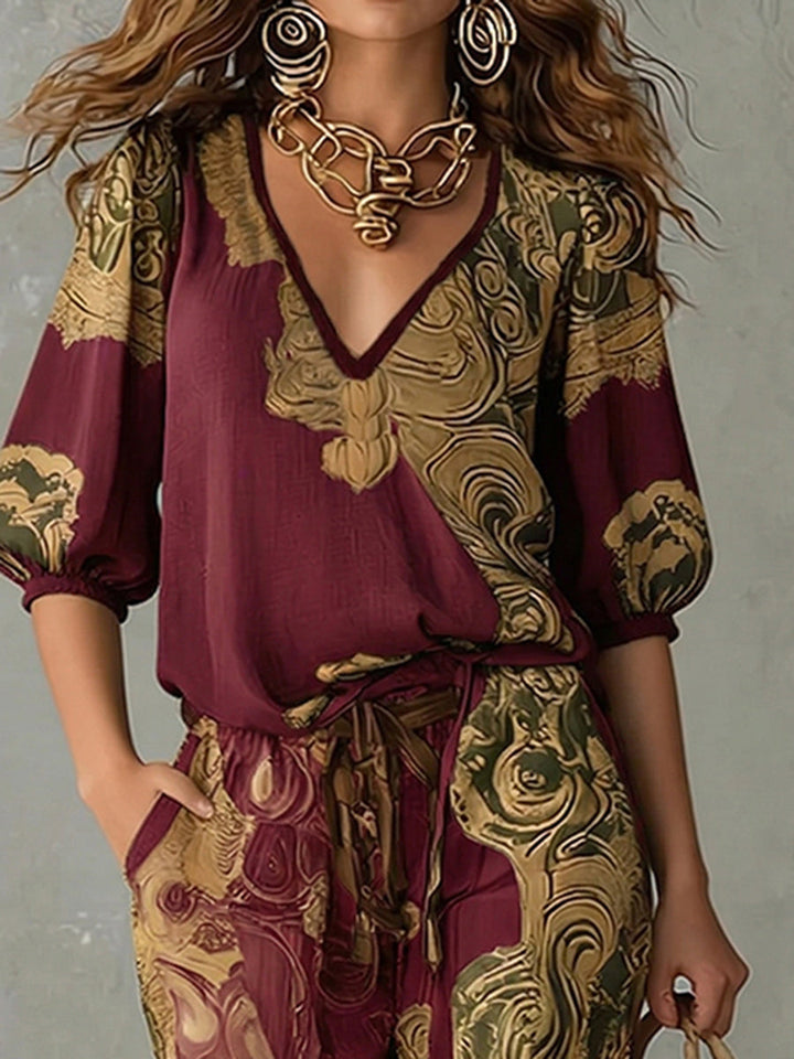 Effortless women's bohemian print casual outfit: a stylish v-neck top and comfortable matching pants co-ord set.