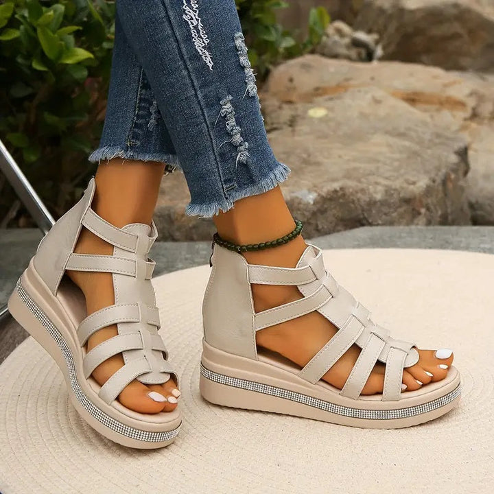 Slip-on women's wedge sandals, offering effortless style and comfort for summer.