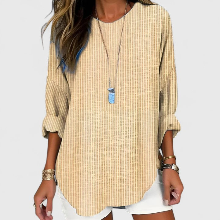 Women's comfortable relaxed fit long sleeve striped blouse. Casual everyday chic top with crew neck for versatile wear.