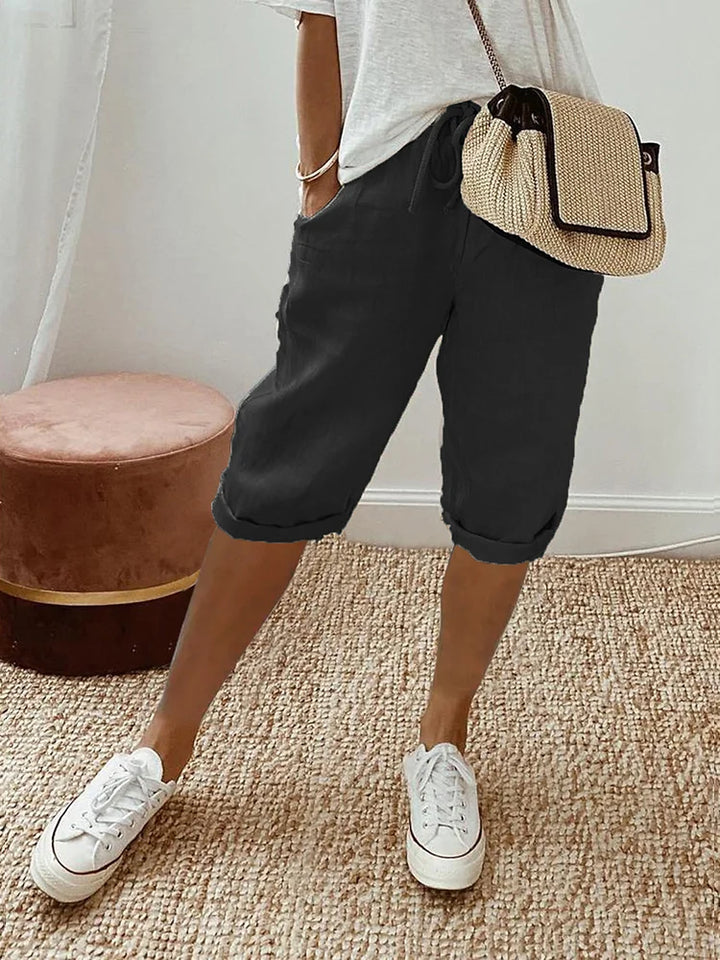 Women's cotton capri pants with drawstring waist, perfect for casual summer wear & comfort.