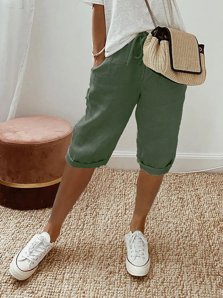 Versatile women's casual cotton capri pants, drawstring waist, comfortable for everyday & summer activities.