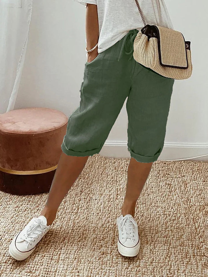 Versatile women's casual cotton capri pants, drawstring waist, comfortable for everyday & summer activities.
