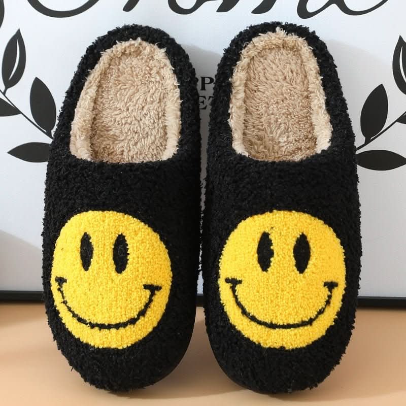 Warm and soft women's house slippers with an embroidered smiley face, ideal for chilly winter mornings.