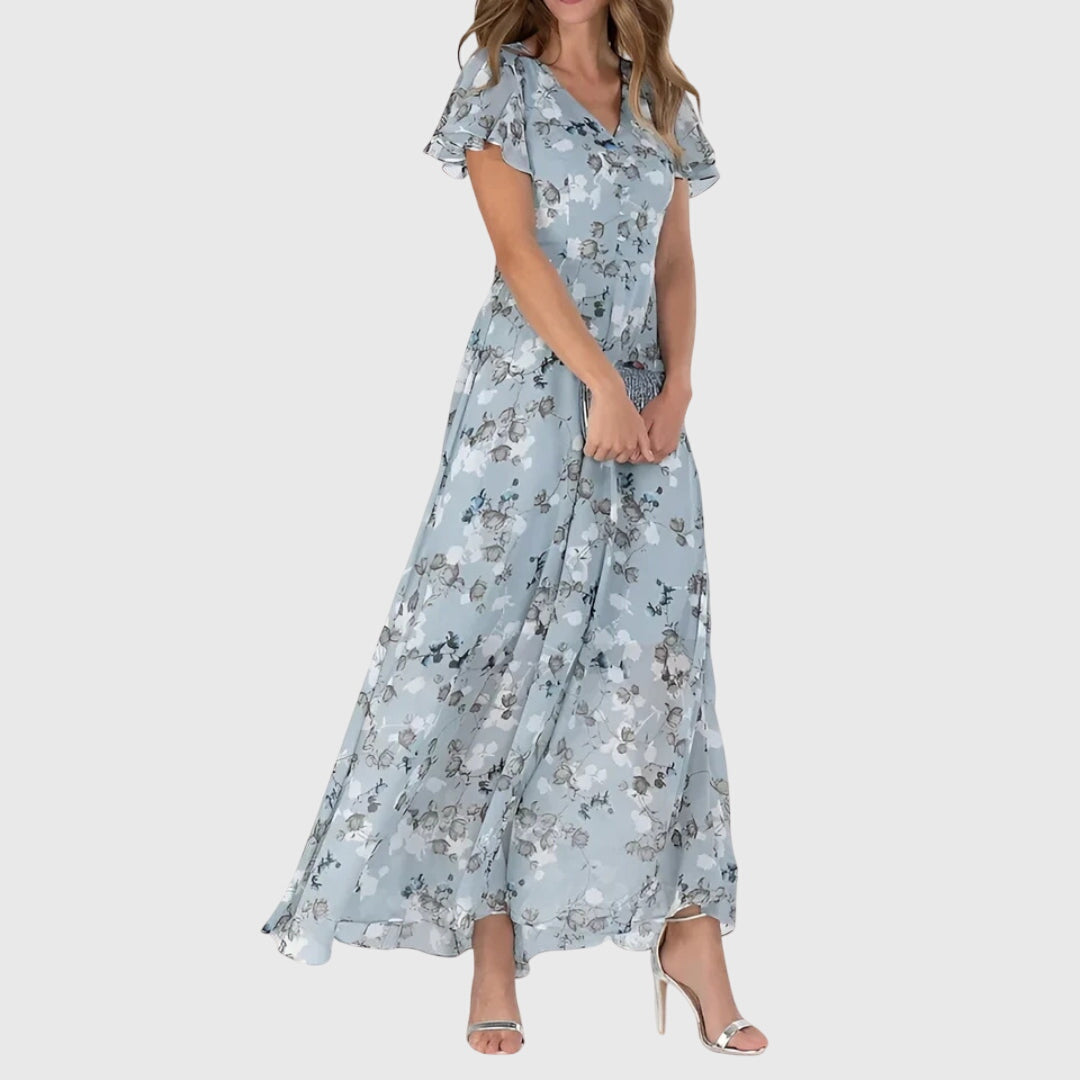 Boho women's long floral maxi dress with V-neck & flutter sleeves. Ideal elegant spring/summer vacation & party wear.