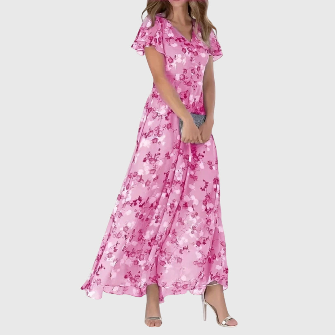 Elegant women's floral V-neck maxi dress with delicate flutter sleeves. Boho-inspired for spring/summer vacation & events.