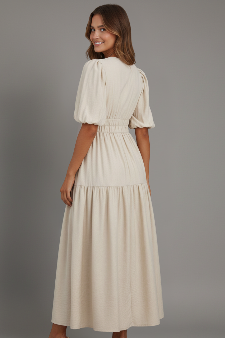 Versatile women's midi dress with V-neck and layered hem. Great for casual chic summer fashion.