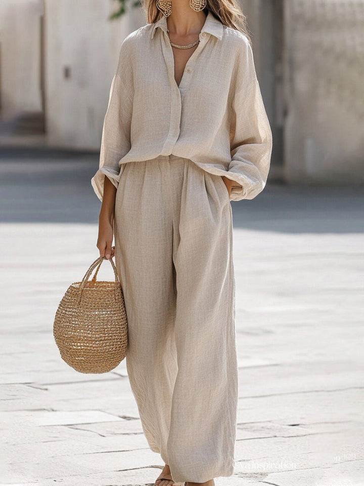 Chic women's two-piece set, featuring a flowy blouse and stylish pants for summer.