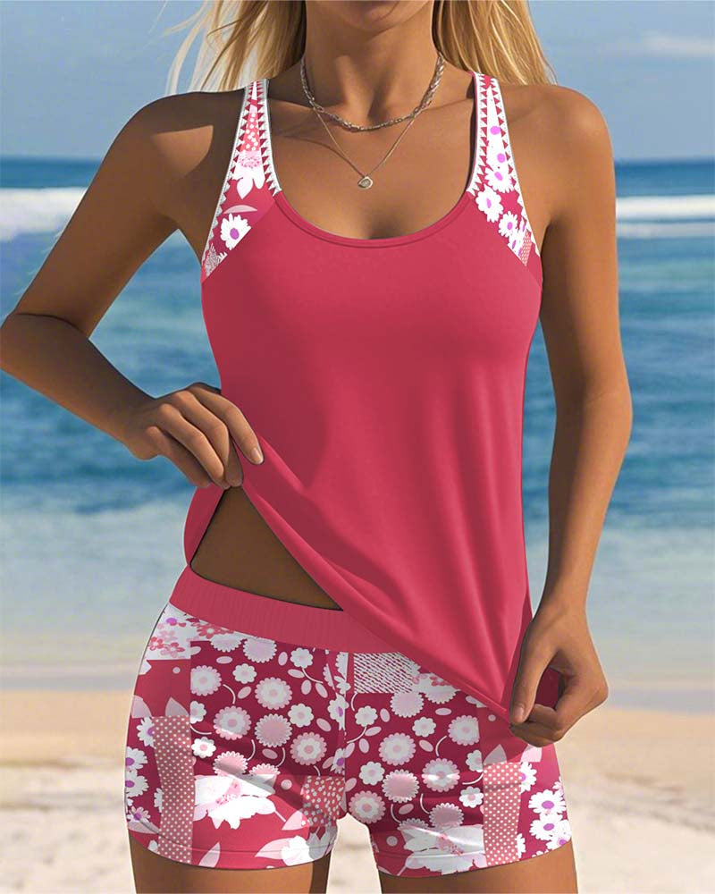 Women's floral print racerback tankini swimsuit set with boyshorts. Perfect two-piece beachwear for summer.