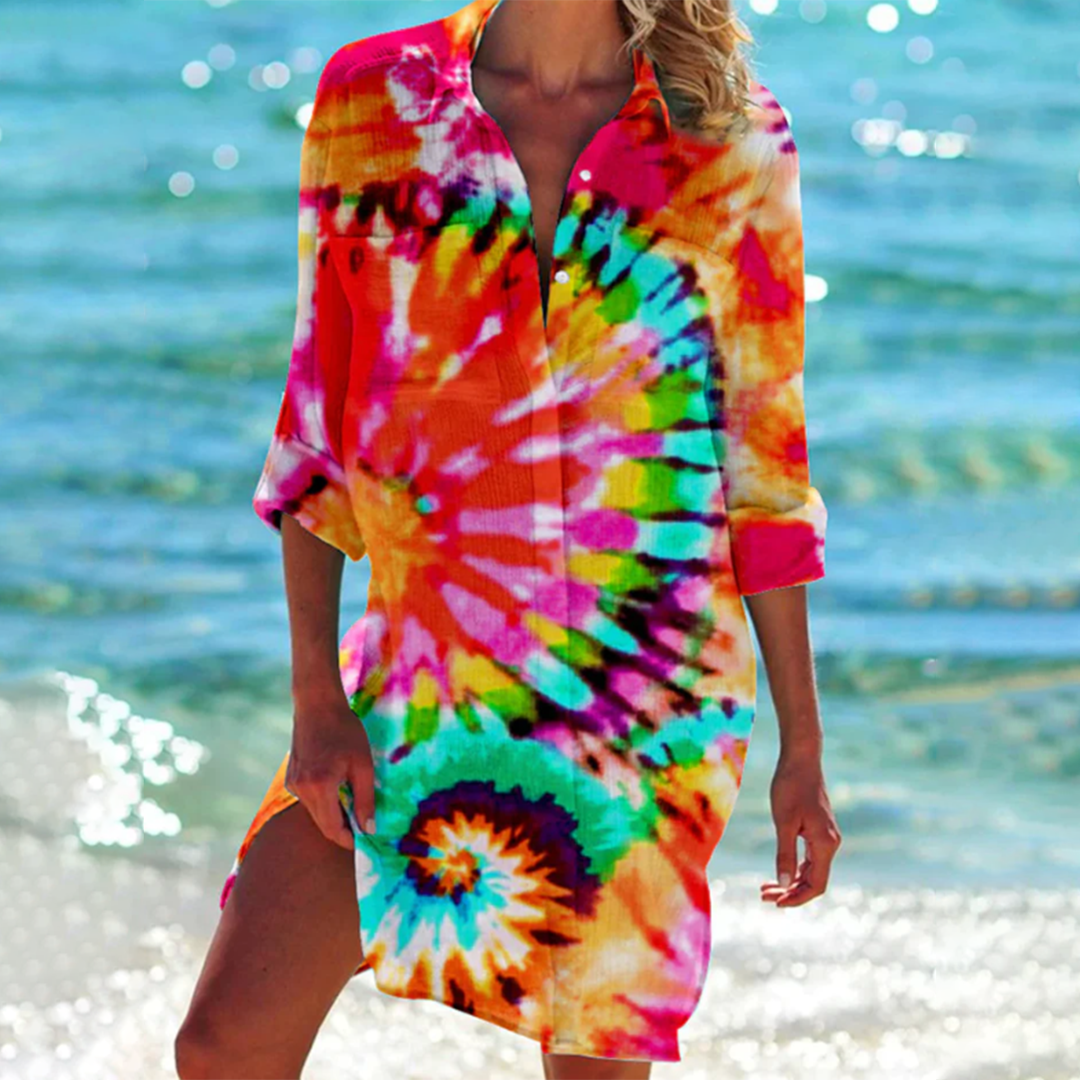 Women's flowy printed summer shirt with practical pockets for casual comfort.