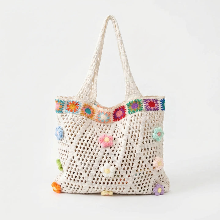 Vibrant floral crochet tote bag for women, a stylish summer accessory for beach outings or a casual day out.