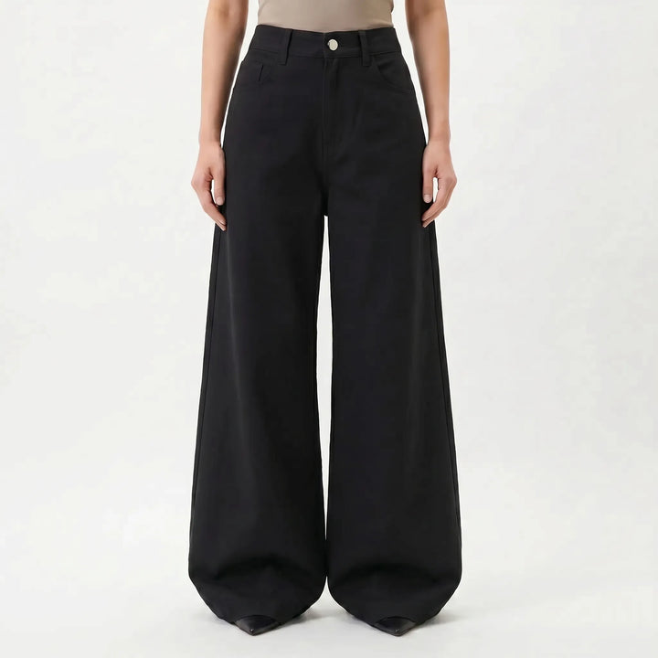 Stylish women's high-waisted wide-leg pants in black, providing a comfortable, chic, and versatile look.