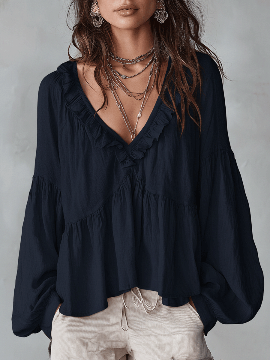 Elegant women's bohemian loose fit blouse with long sleeves & ruffles. Versatile vintage style top.