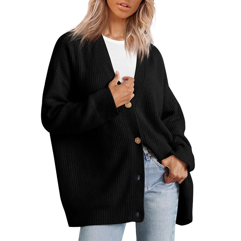 Women's luxurious oversized cardigan in soft knit, perfect for chic layering & comfort.