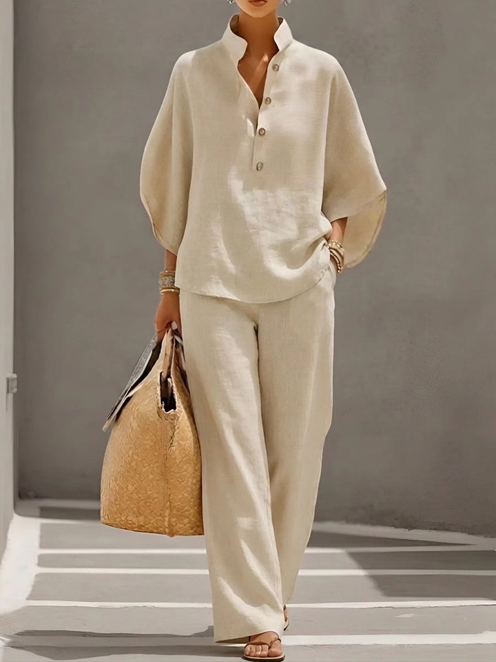 Relaxed women's summer fashion set: kimono sleeve top, wide leg pants, mandarin collar details.