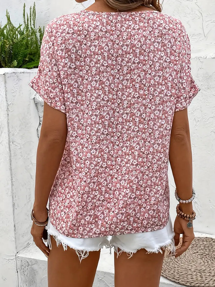 Effortless Maren blouse for women, featuring a modern floral print and comfortable loose fit. Perfect for elegant casual wear.