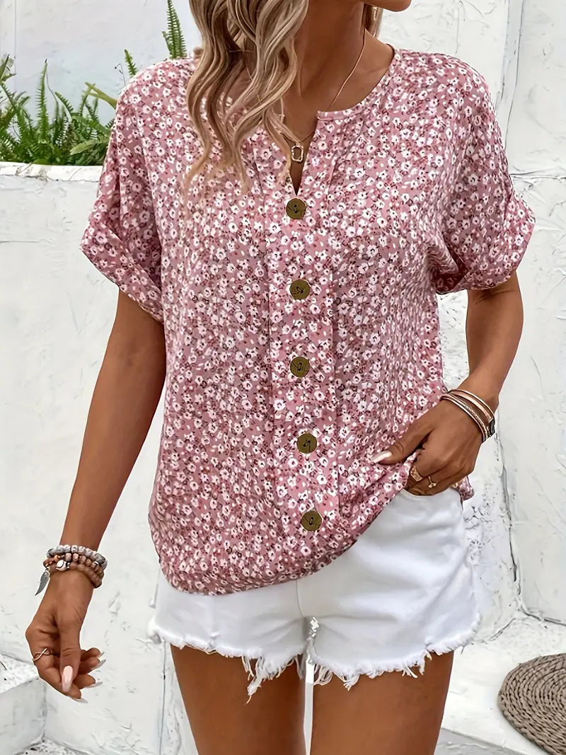 Stylish women's Maren long-sleeve blouse in a vibrant floral print, designed with a classic button-up front.