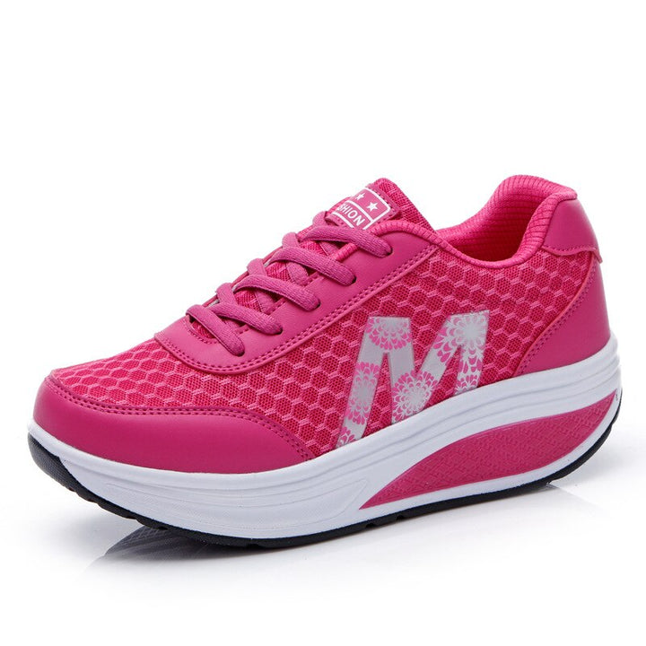 Posture corrective women's sneakers with superior arch support & comfort for daily walking.