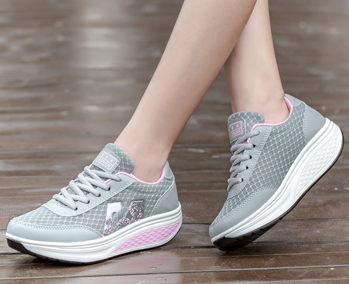 Lightweight women's comfort footwear, orthopedic design with corrective support for active lifestyles.