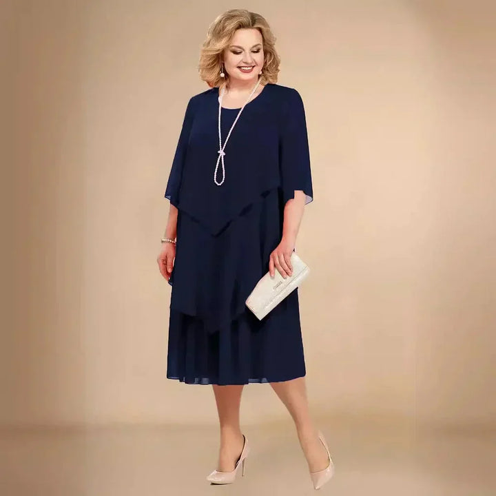 Layered plus size asymmetrical midi dress, chic evening wear & formal party attire.