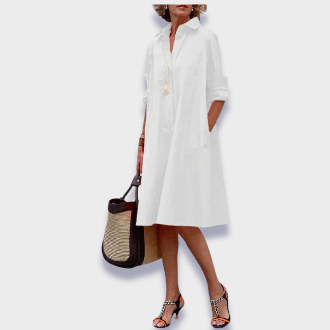 Comfortable women's relaxed fit button-up shirt midi dress with convenient pockets, versatile for summer or casual wear.