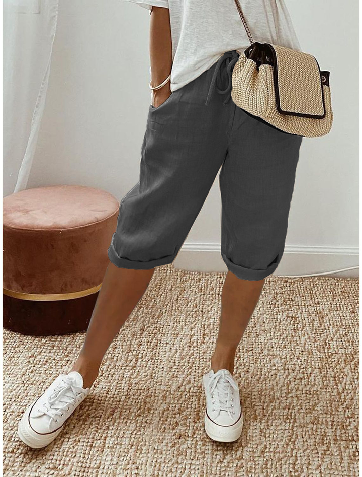 Women's relaxed fit capri trousers. Comfortable elastic waist, perfect mid-calf summer pants.