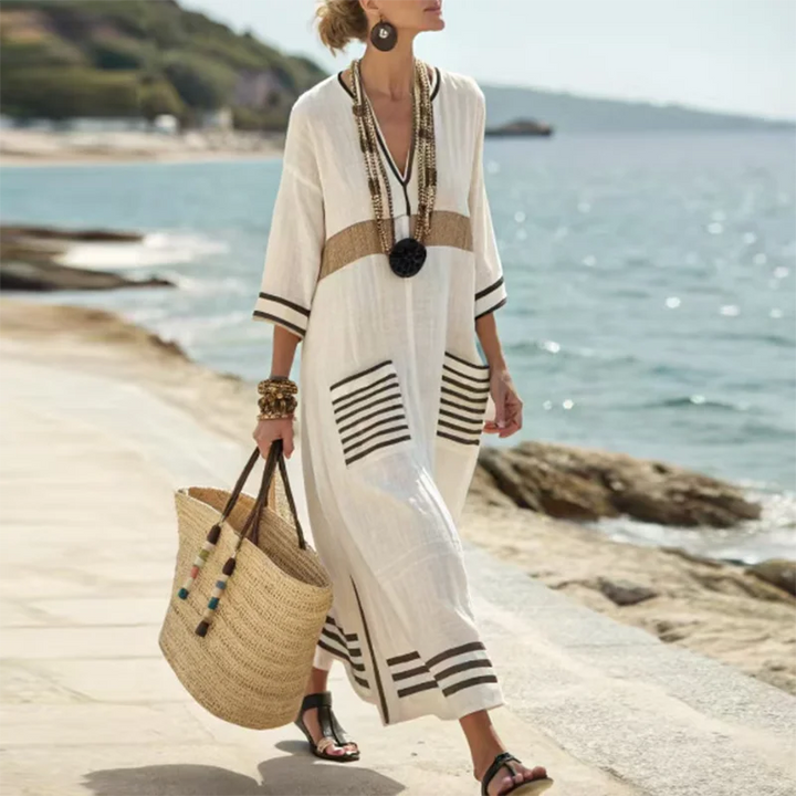 Santorini-inspired women's striped kaftan dress. Flowy summer long dress for beach, resort, or casual wear.