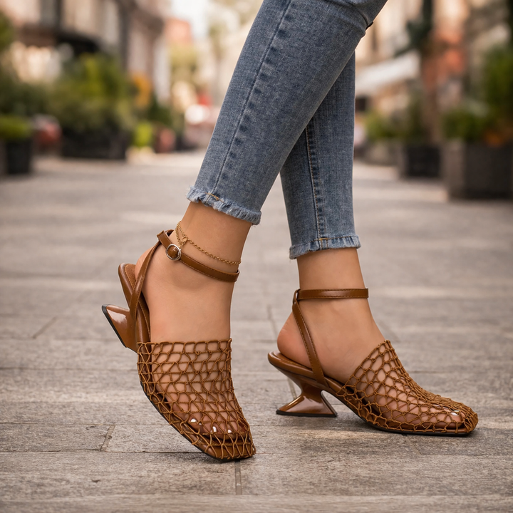 Women's sculpted heel strappy sandals in elegant design. Perfect dress shoes with an ankle strap.