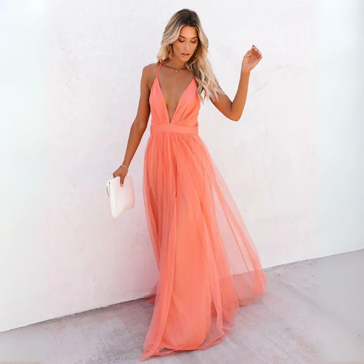 Beautiful orange sleeveless V-neck maxi dress for women, ideal for special occasion and wedding guest attire.