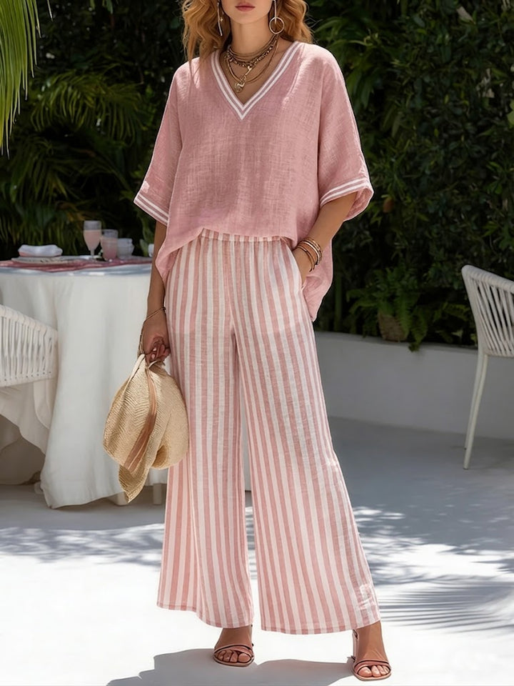 Comfortable women's two-piece striped V-neck top & wide leg pants set, ideal for loungewear or travel.