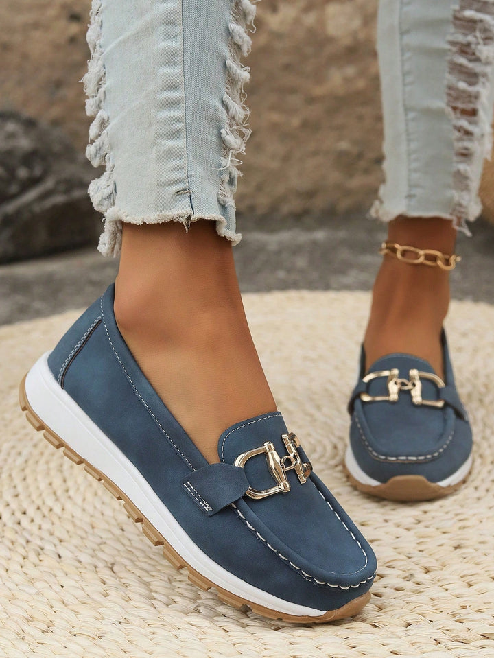 Versatile blue women's flat loafers with buckle detail. Comfortable slip-on shoes for walking & daily use.