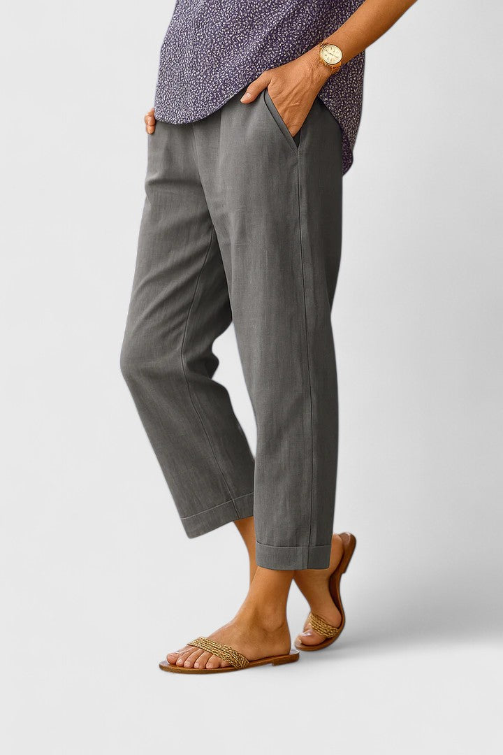 Women's straight leg pocket pants with a chic tailored cuff hem. Versatile bottoms for professional or daily wear.