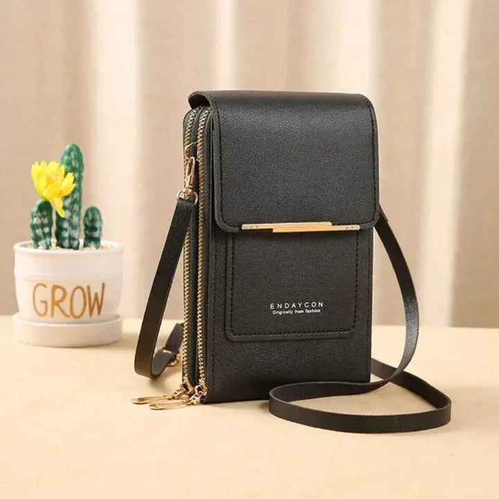 Women's touch screen crossbody phone bag with adjustable strap, perfect for hands-free convenience & daily use.
