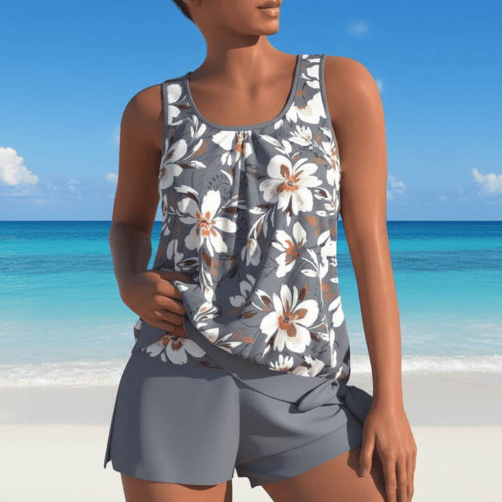 Vibrant two-tone floral tankini swimwear for women, perfect for a stylish day at the beach or pool.