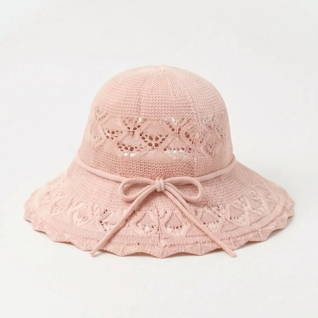 Fashionable women's wide brim sun hat, a stylish accessory for summer, beach vacations & sun protection.